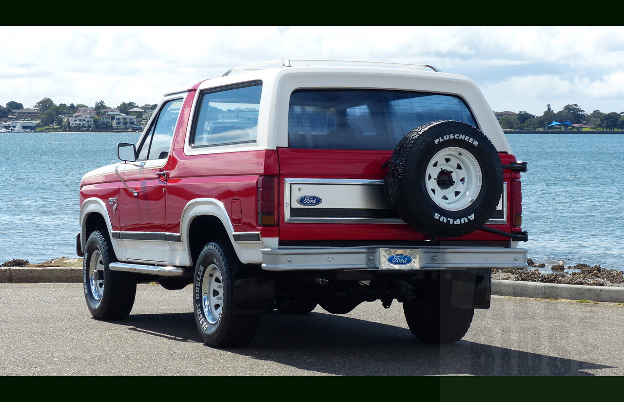 10/1984 Ford Bronco XLT (4x4) 2d Wagon Monza Red/White 351ci 5.8L V8