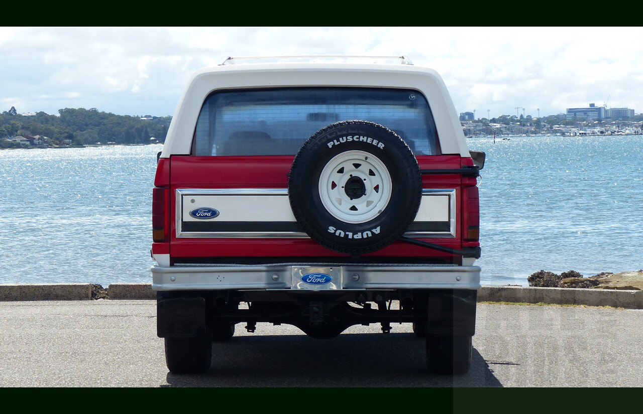 10/1984 Ford Bronco XLT (4x4) 2d Wagon Monza Red/White 351ci 5.8L V8