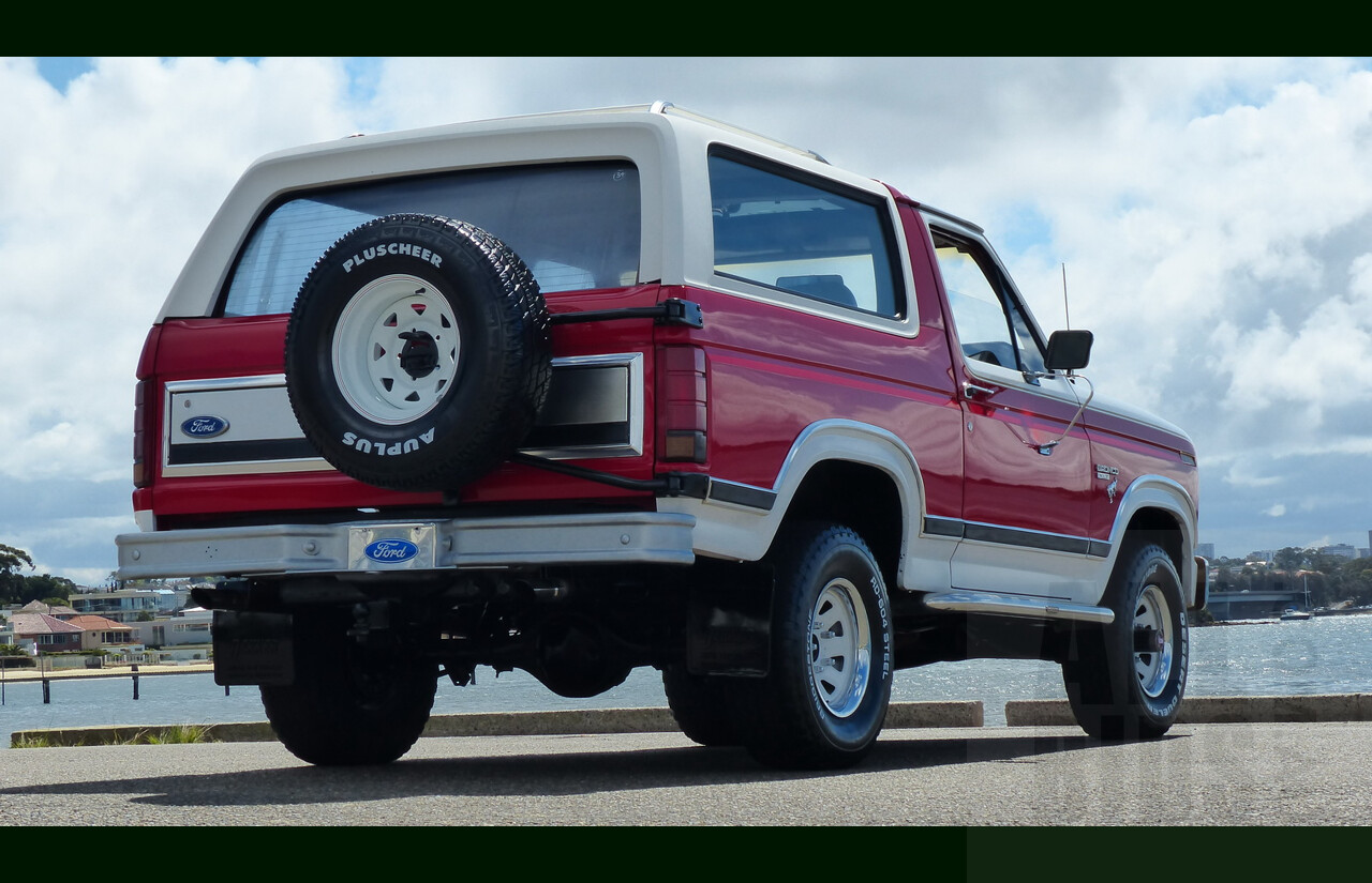 10/1984 Ford Bronco XLT (4x4) 2d Wagon Monza Red/White 351ci 5.8L V8