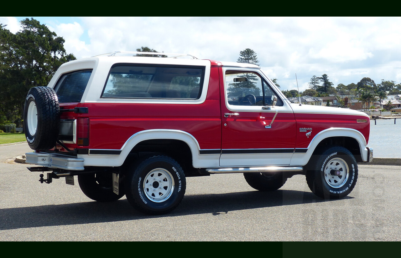 10/1984 Ford Bronco XLT (4x4) 2d Wagon Monza Red/White 351ci 5.8L V8