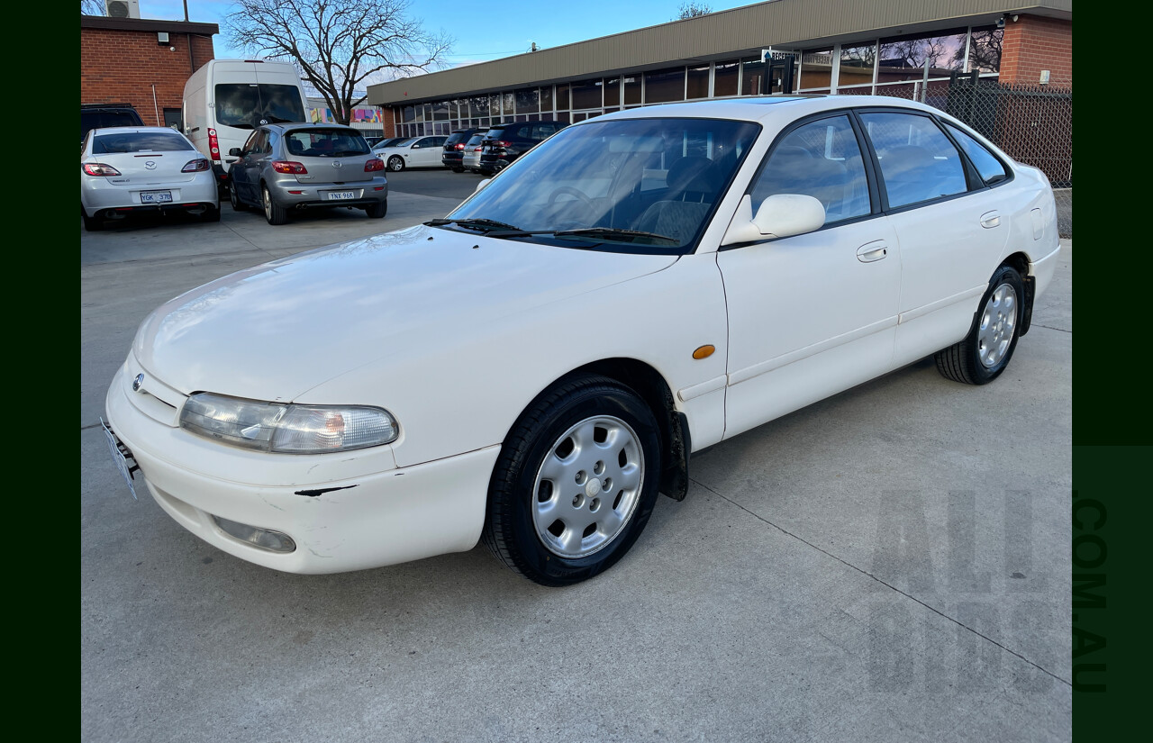 3/1994 Mazda 626  5d Hatchback White 2.5L