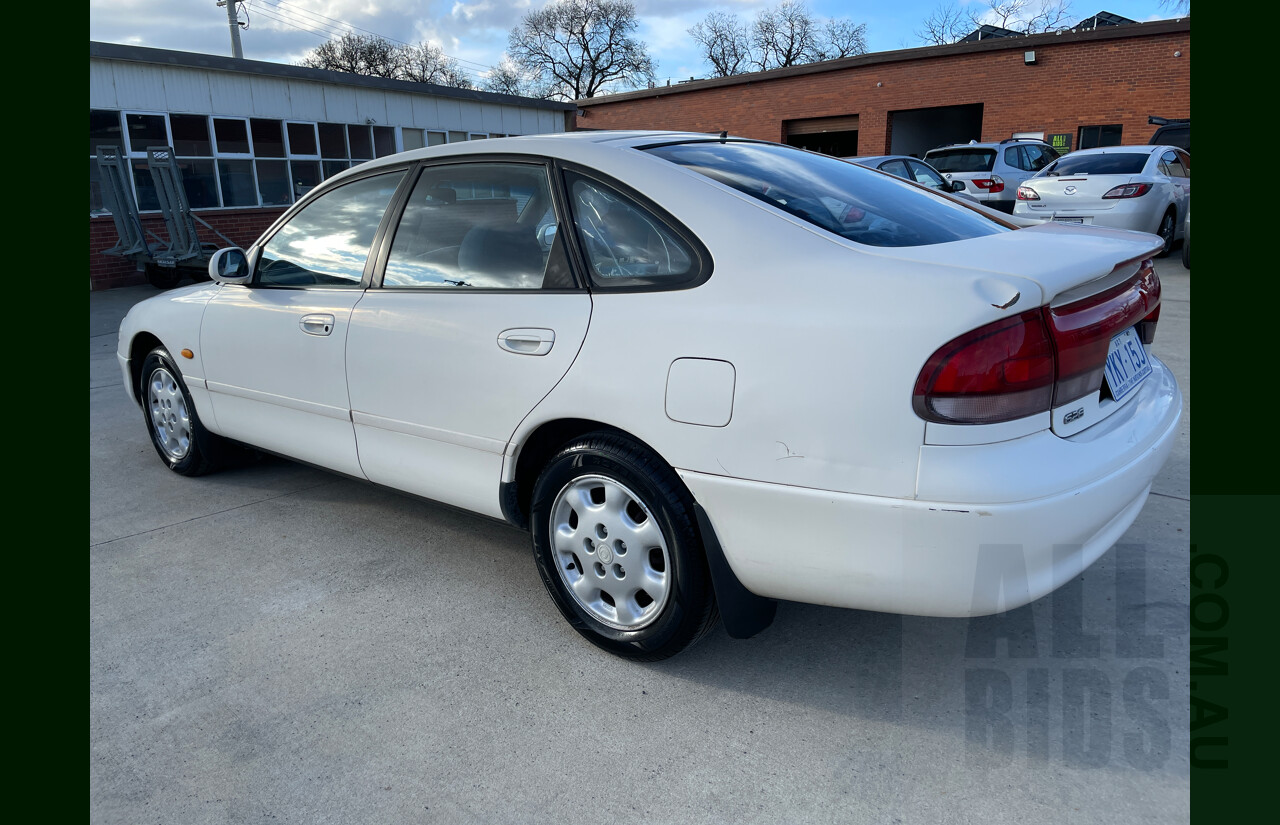 3/1994 Mazda 626  5d Hatchback White 2.5L