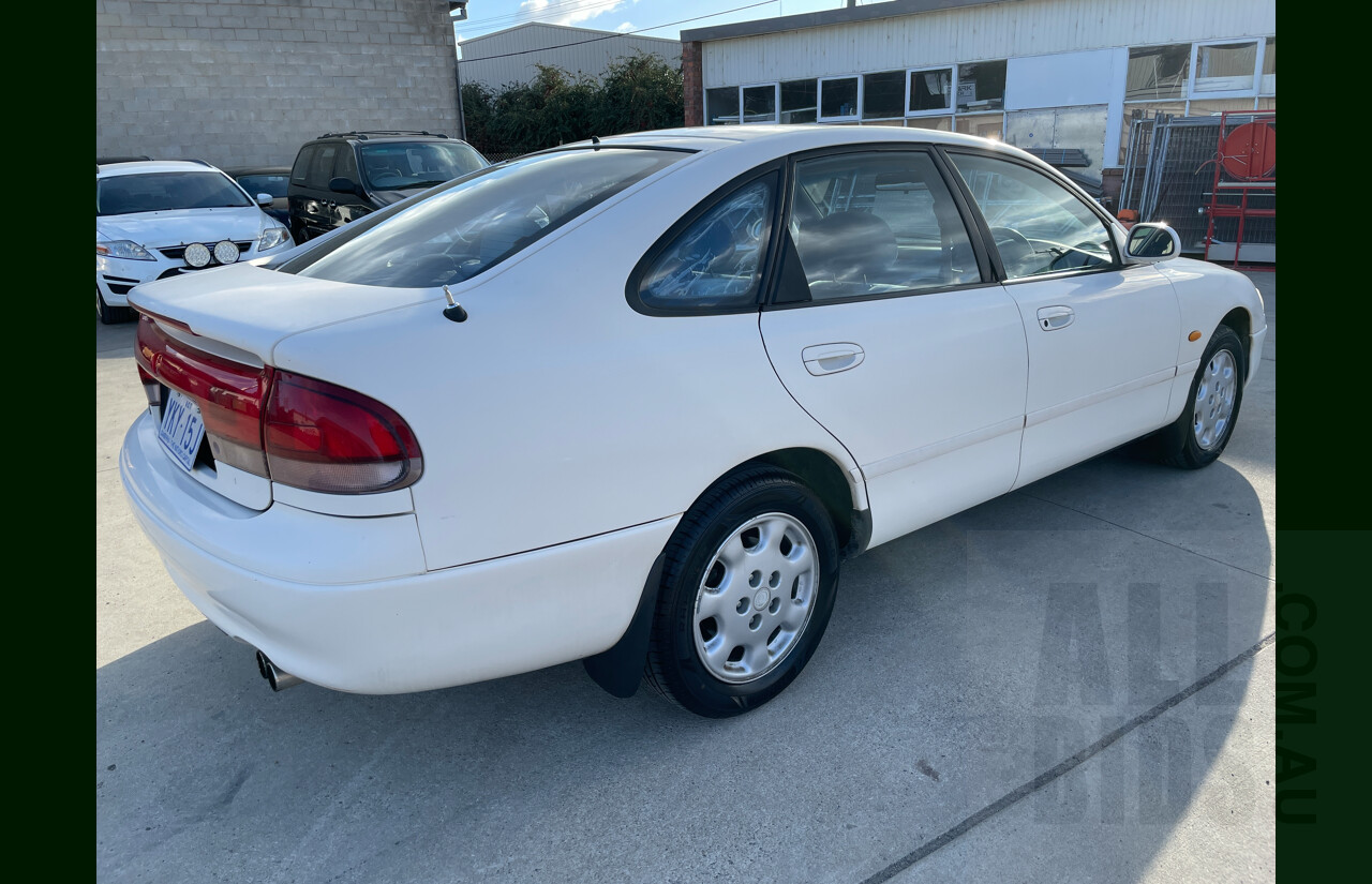 3/1994 Mazda 626  5d Hatchback White 2.5L