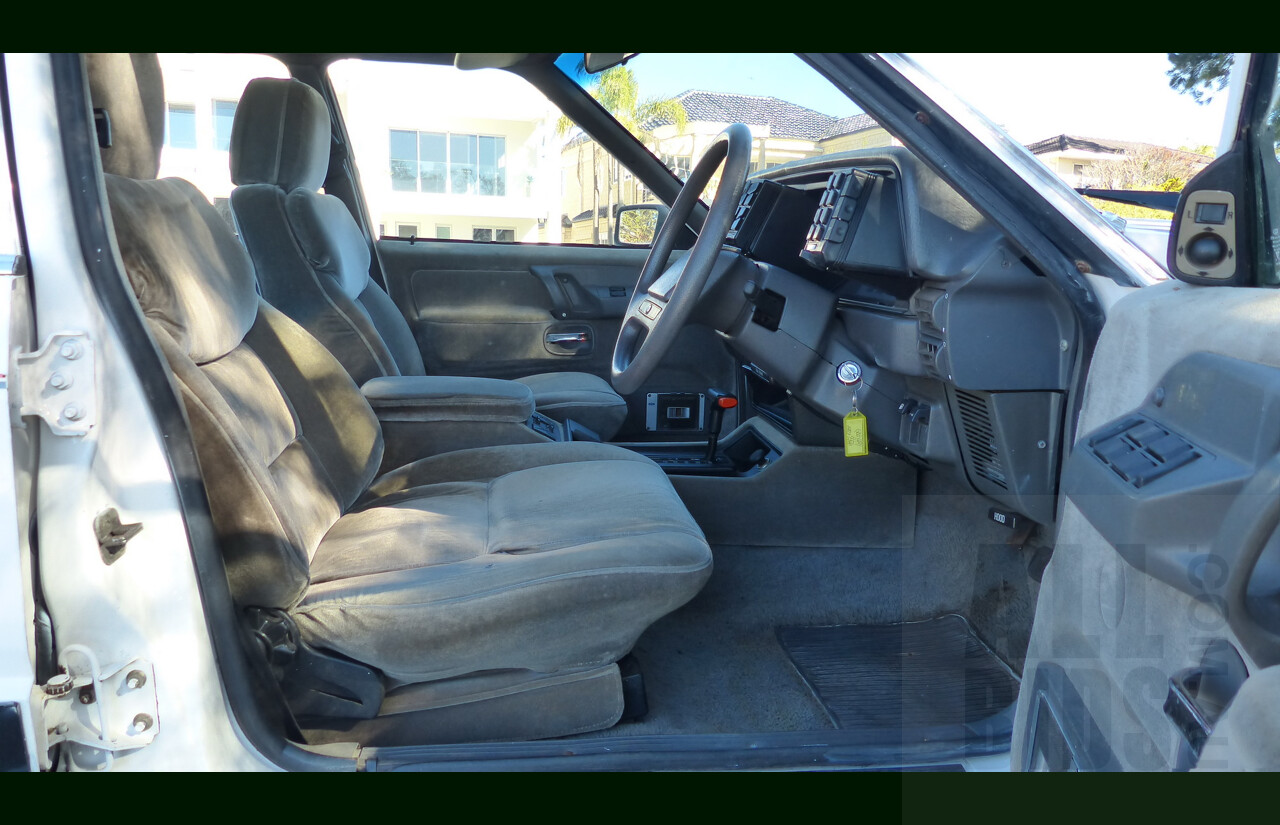 9/1987 Ford LTD FE 4d Sedan White Auto EFI 4.0L