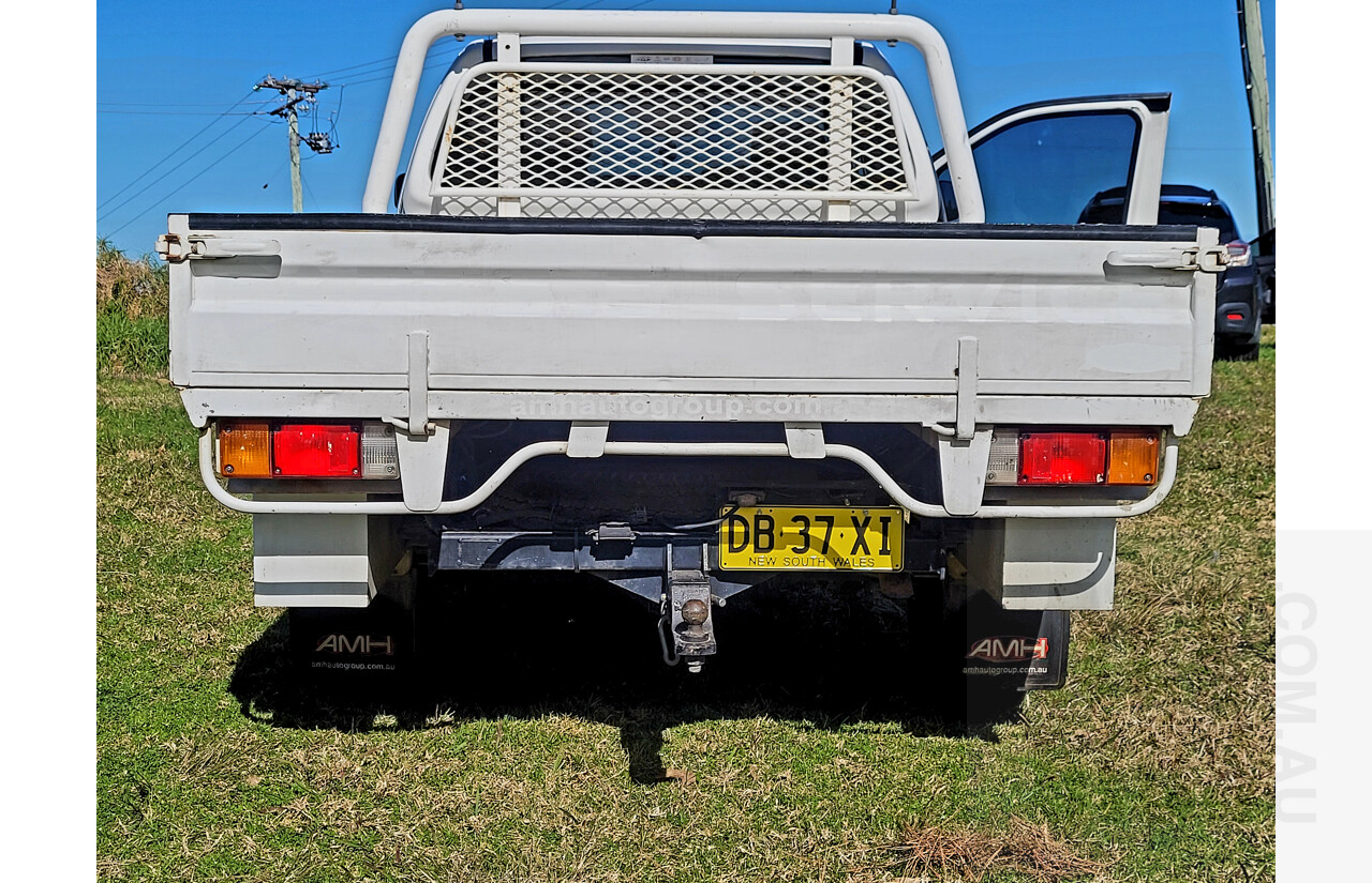 2/2010 Nissan Navara RX (4x4) D40 King C/Chas White 2.5L Turbo Diesel