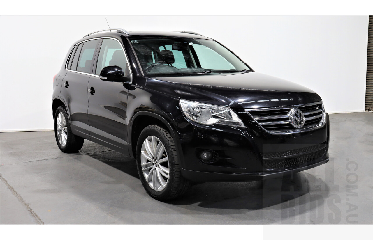 2/2010 Volkswagen Tiguan TSI 5NC 4d Wagon Black 2.0L Turbo