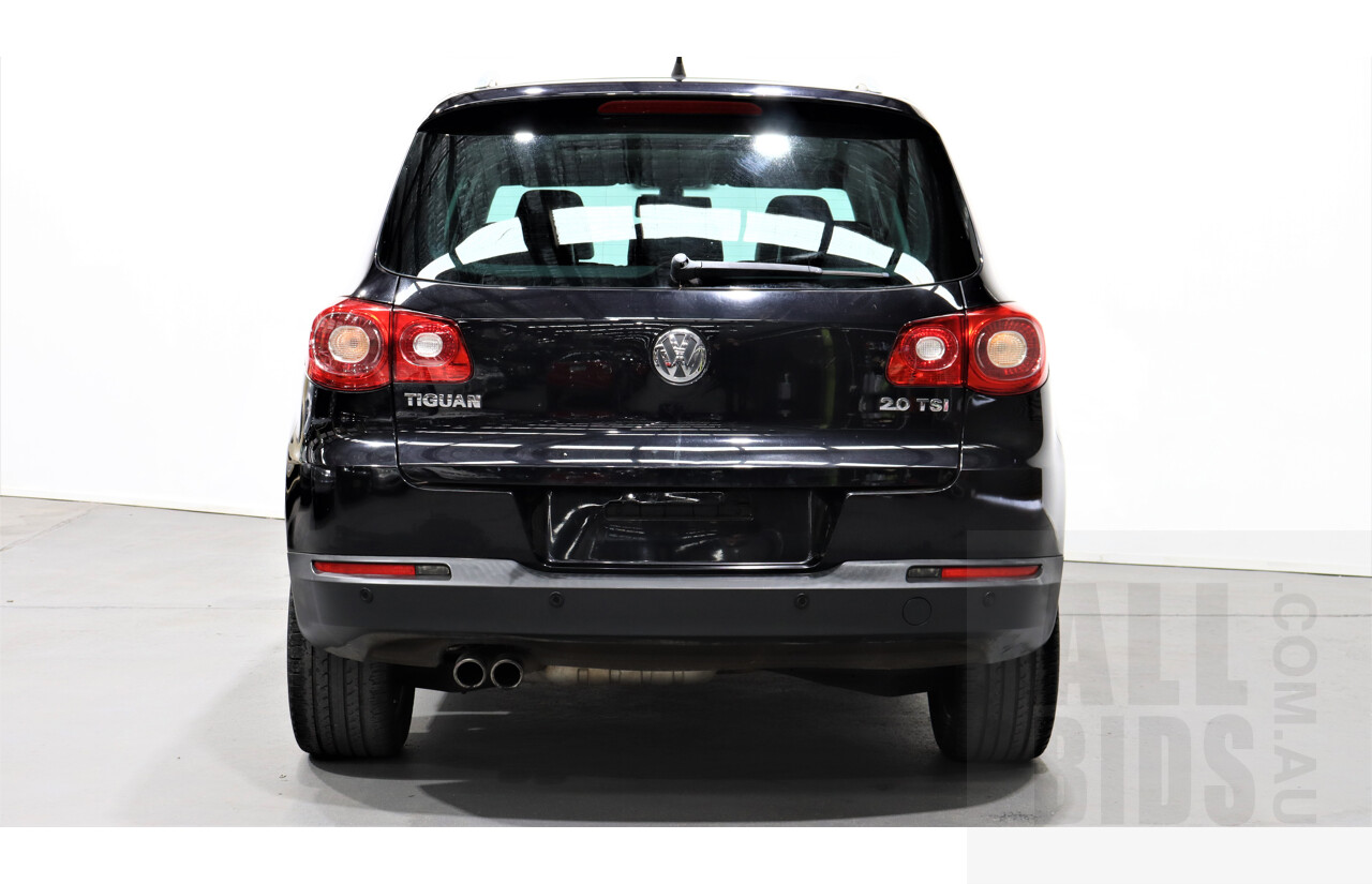 2/2010 Volkswagen Tiguan TSI 5NC 4d Wagon Black 2.0L Turbo