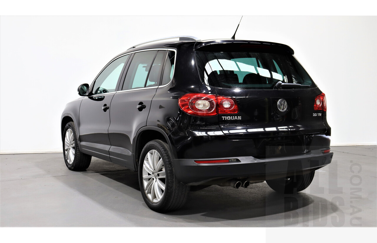2/2010 Volkswagen Tiguan TSI 5NC 4d Wagon Black 2.0L Turbo
