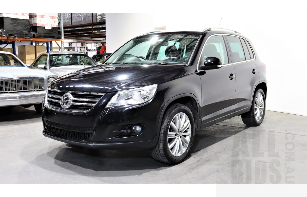 2/2010 Volkswagen Tiguan TSI 5NC 4d Wagon Black 2.0L Turbo
