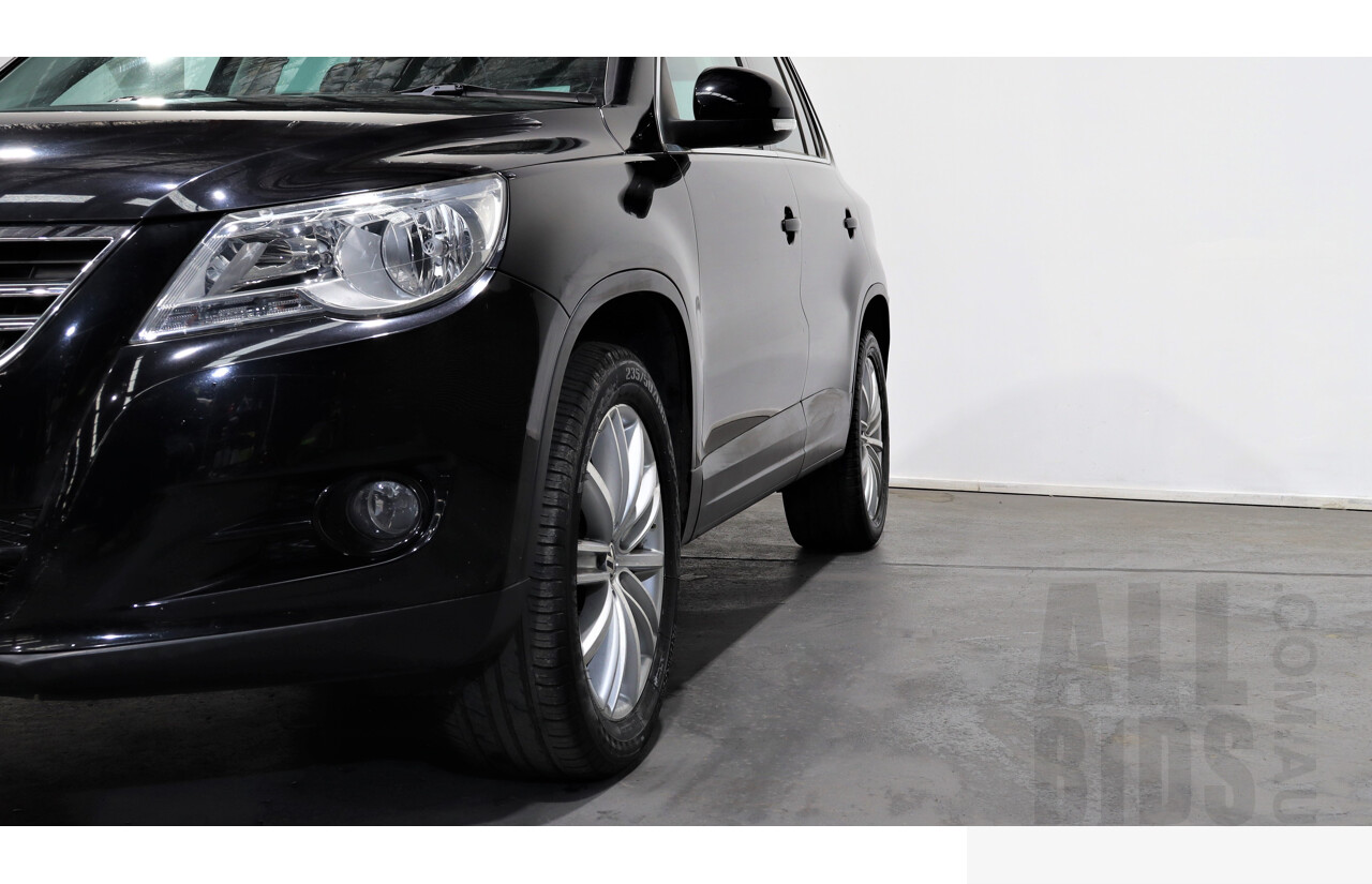 2/2010 Volkswagen Tiguan TSI 5NC 4d Wagon Black 2.0L Turbo