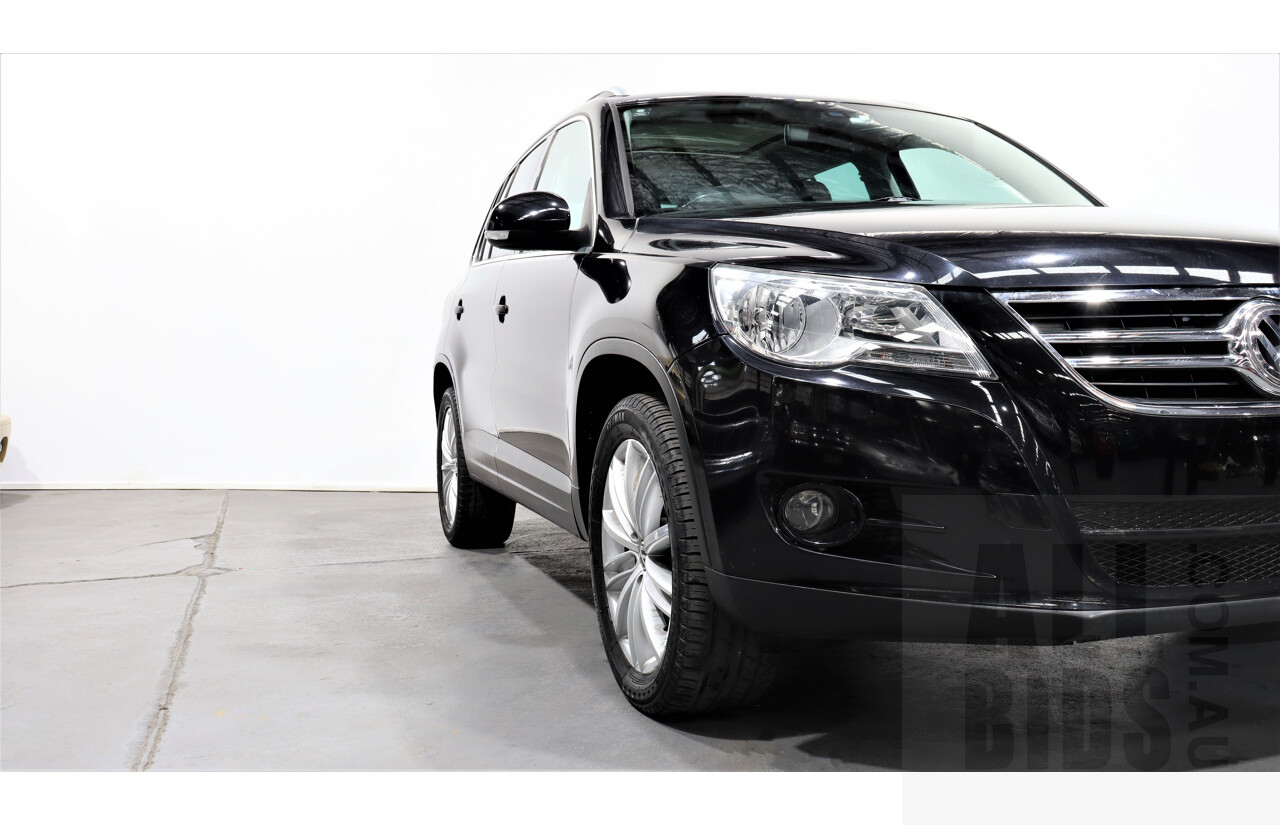 2/2010 Volkswagen Tiguan TSI 5NC 4d Wagon Black 2.0L Turbo