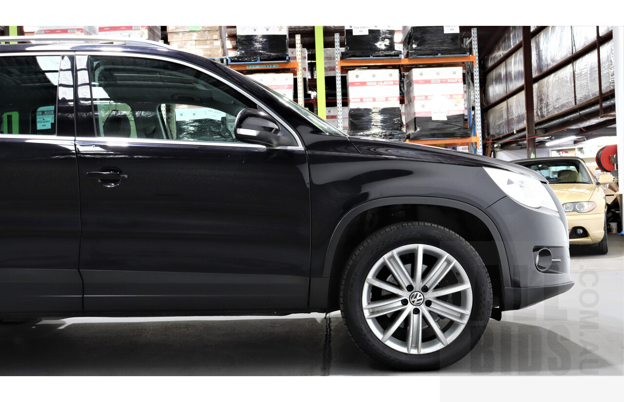 2/2010 Volkswagen Tiguan TSI 5NC 4d Wagon Black 2.0L Turbo