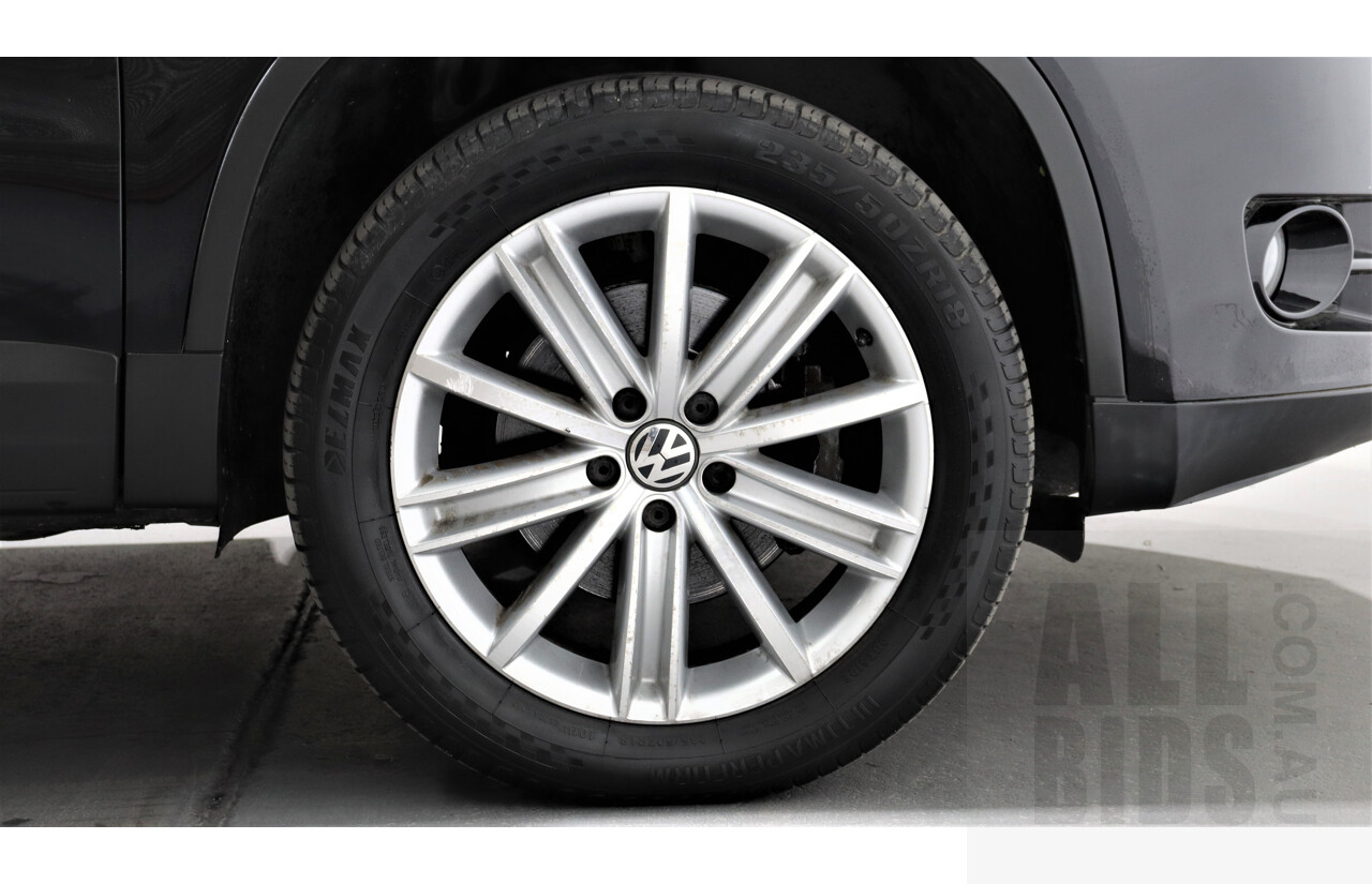 2/2010 Volkswagen Tiguan TSI 5NC 4d Wagon Black 2.0L Turbo