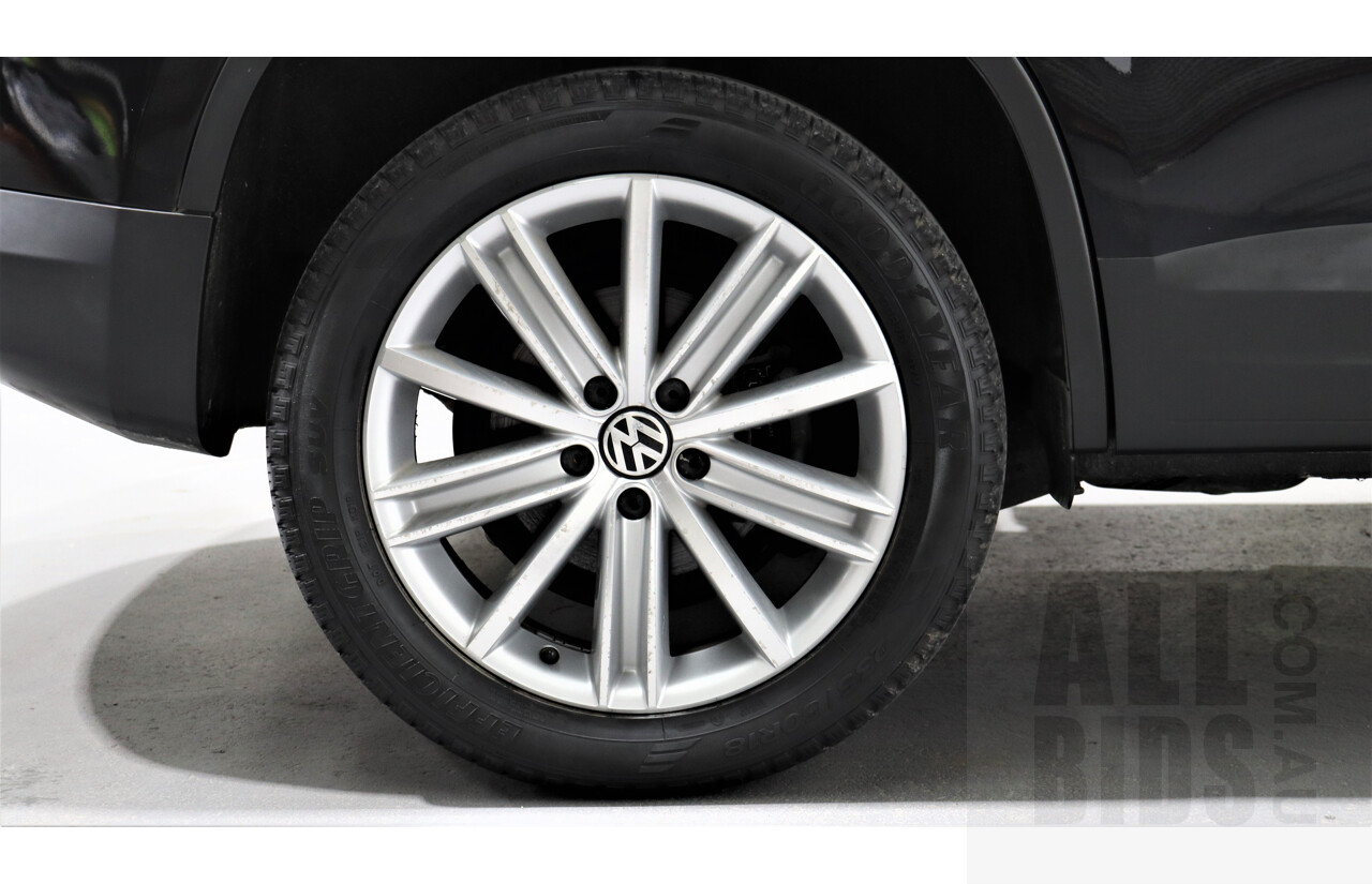 2/2010 Volkswagen Tiguan TSI 5NC 4d Wagon Black 2.0L Turbo