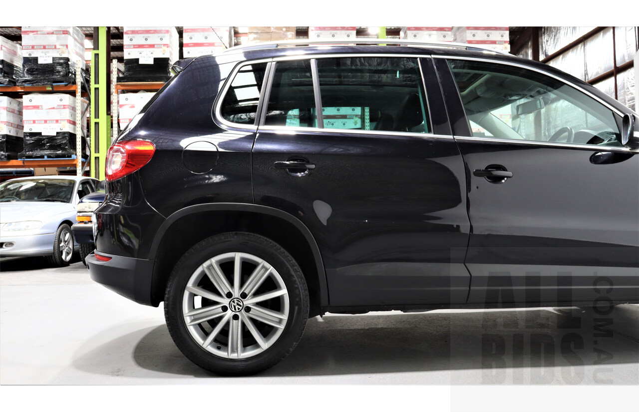 2/2010 Volkswagen Tiguan TSI 5NC 4d Wagon Black 2.0L Turbo
