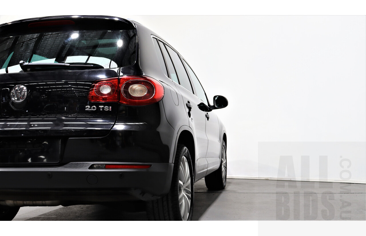 2/2010 Volkswagen Tiguan TSI 5NC 4d Wagon Black 2.0L Turbo