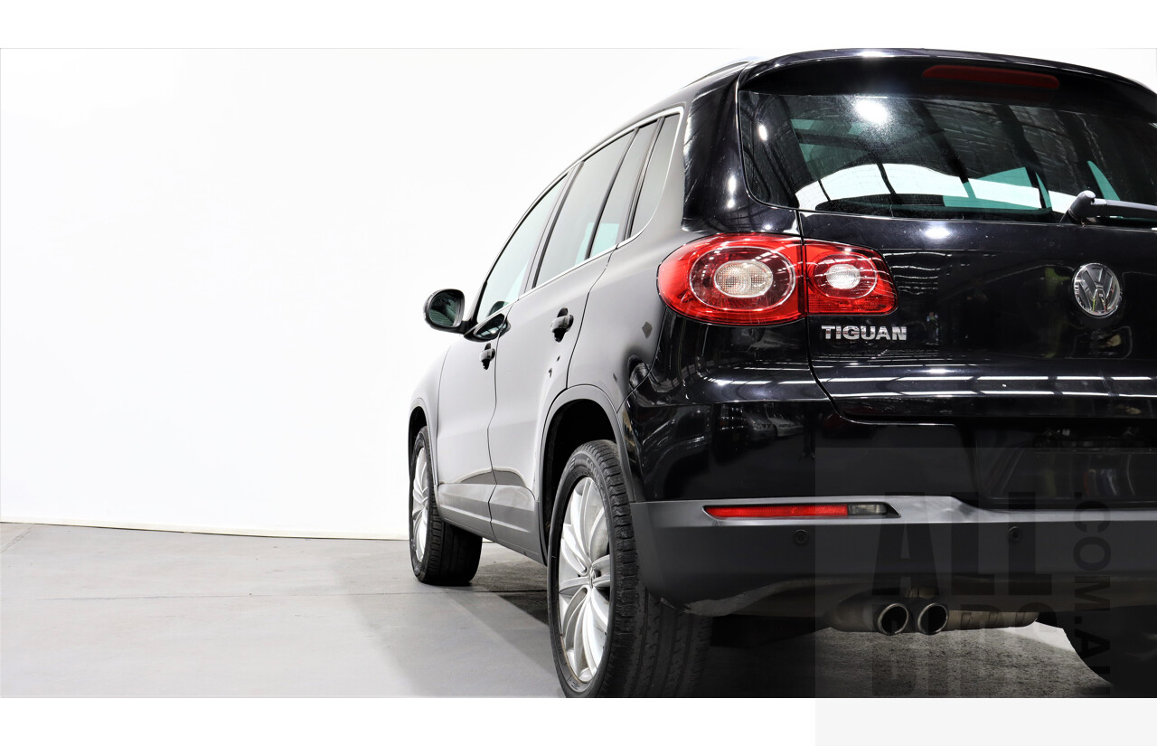 2/2010 Volkswagen Tiguan TSI 5NC 4d Wagon Black 2.0L Turbo