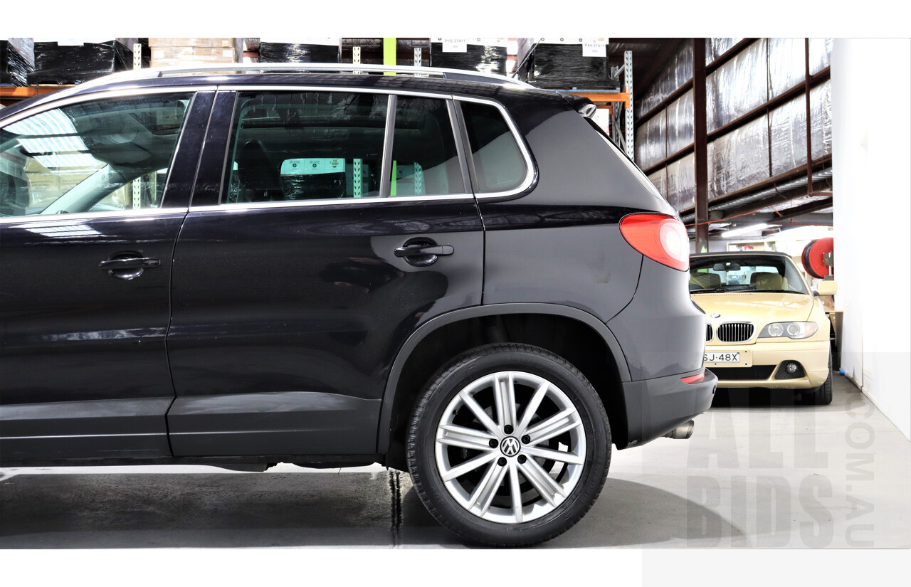 2/2010 Volkswagen Tiguan TSI 5NC 4d Wagon Black 2.0L Turbo