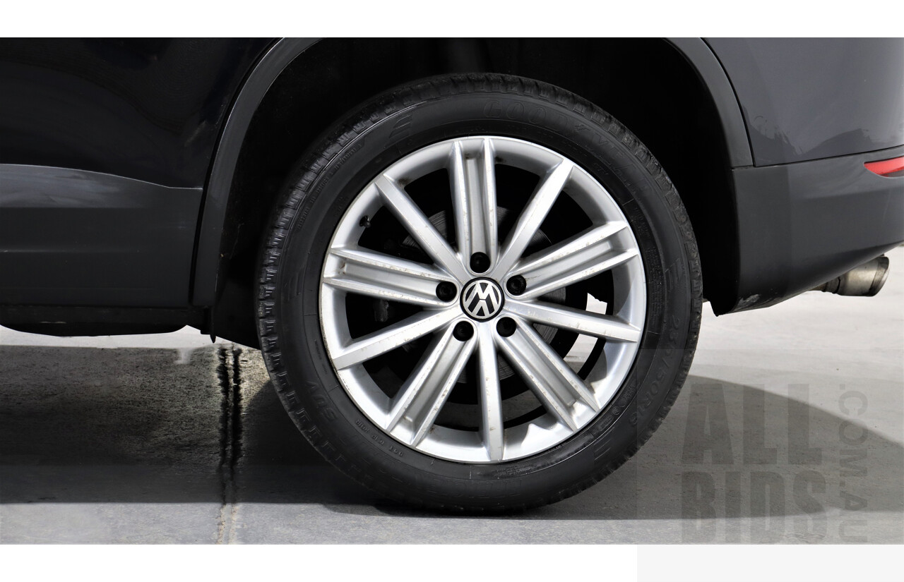 2/2010 Volkswagen Tiguan TSI 5NC 4d Wagon Black 2.0L Turbo