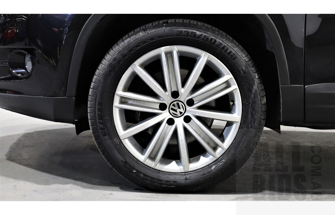 2/2010 Volkswagen Tiguan TSI 5NC 4d Wagon Black 2.0L Turbo