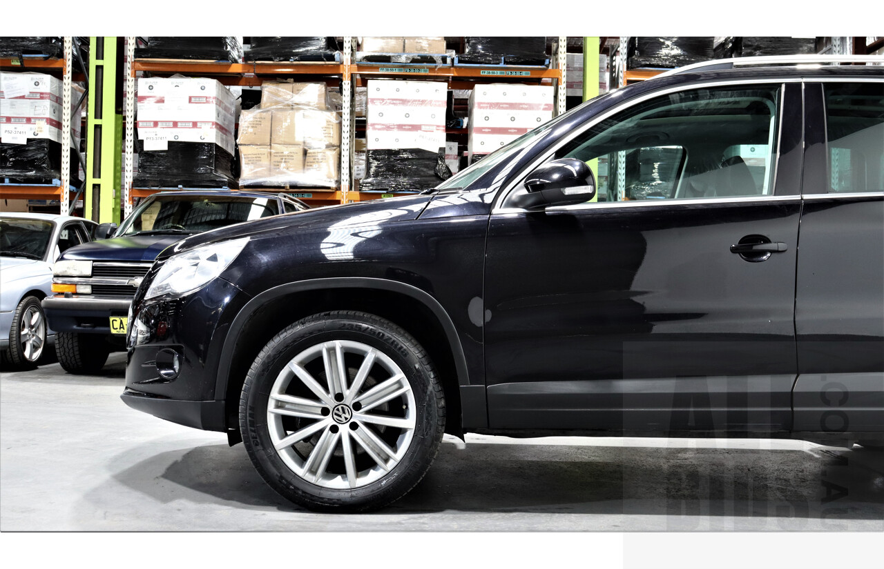 2/2010 Volkswagen Tiguan TSI 5NC 4d Wagon Black 2.0L Turbo