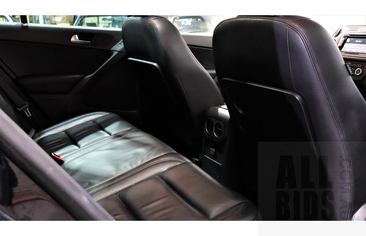 2/2010 Volkswagen Tiguan TSI 5NC 4d Wagon Black 2.0L Turbo