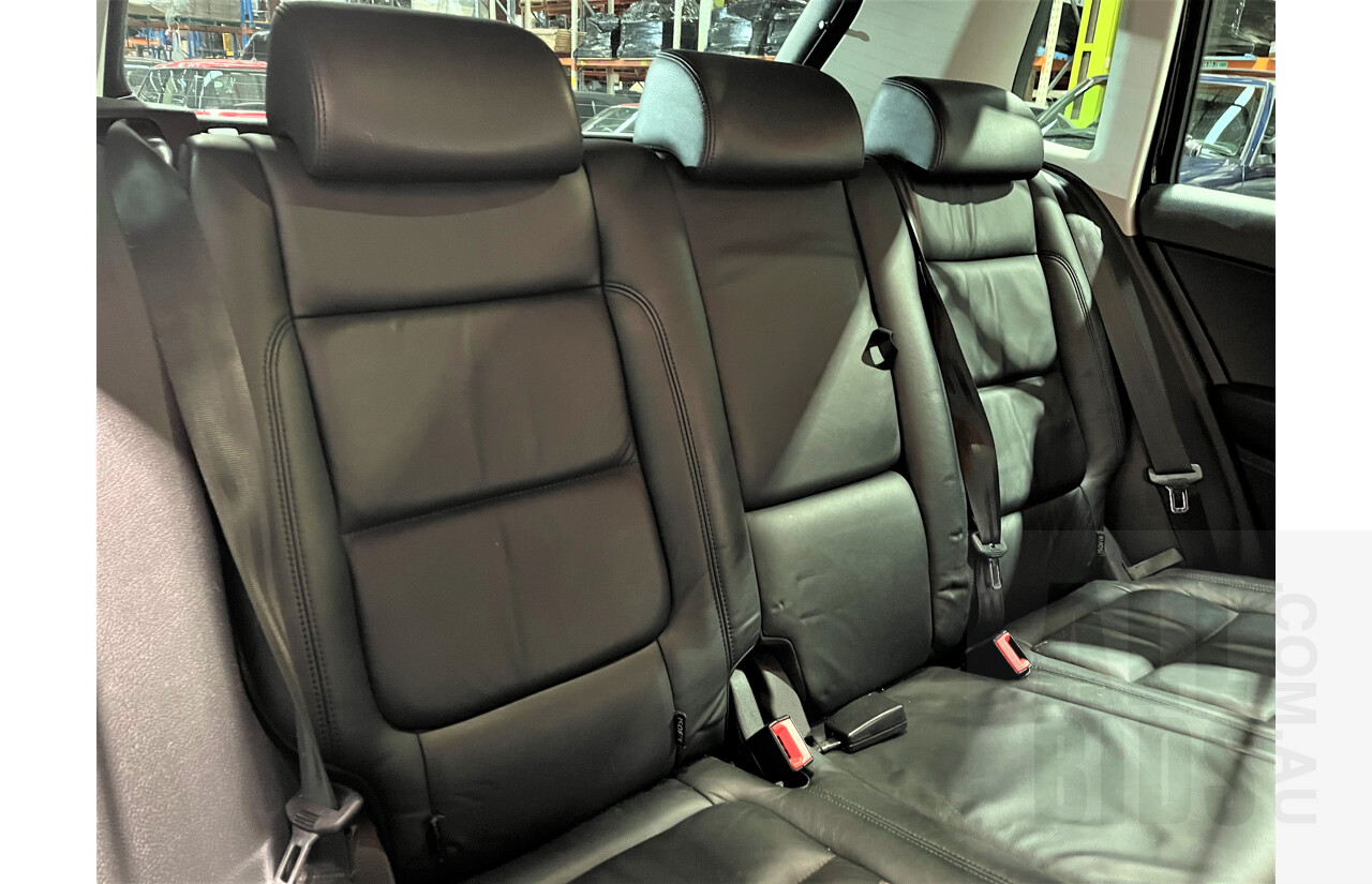 2/2010 Volkswagen Tiguan TSI 5NC 4d Wagon Black 2.0L Turbo