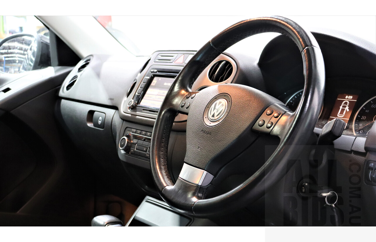 2/2010 Volkswagen Tiguan TSI 5NC 4d Wagon Black 2.0L Turbo