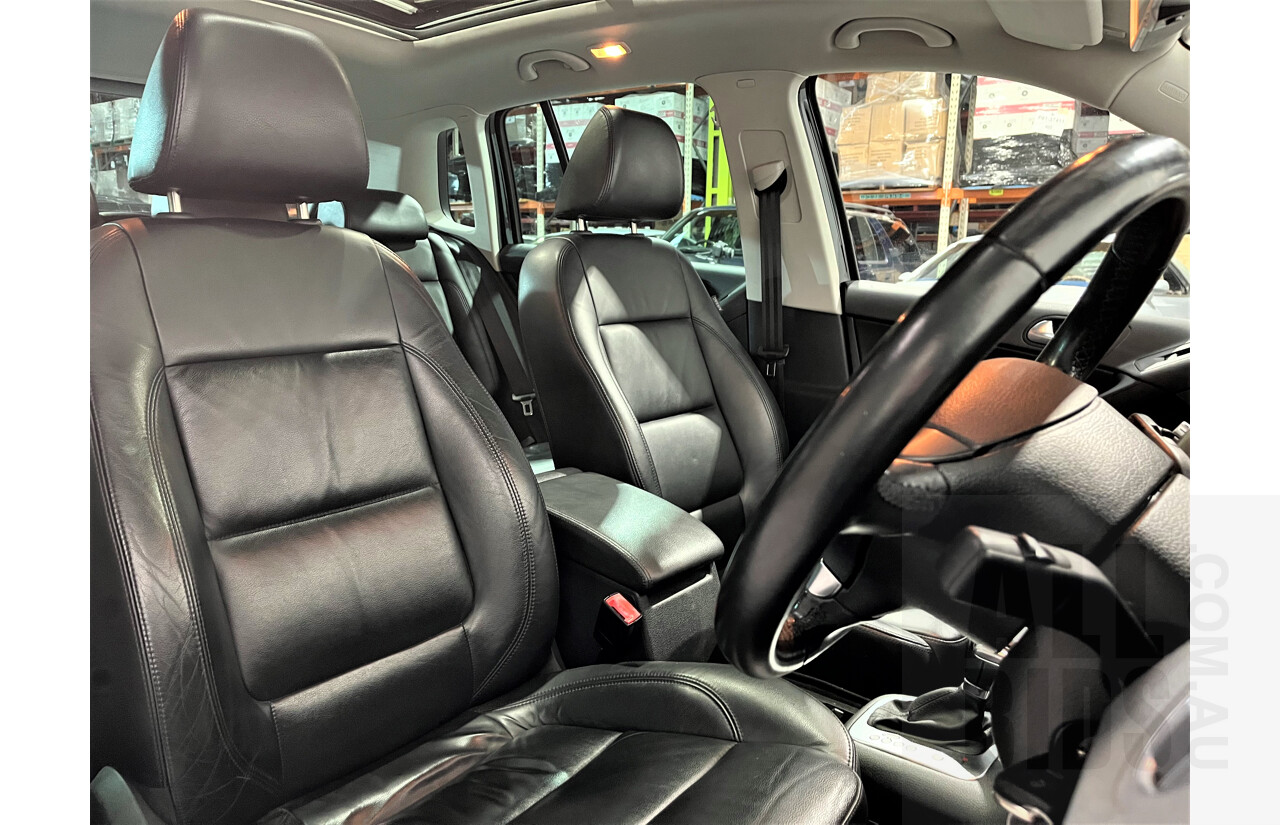 2/2010 Volkswagen Tiguan TSI 5NC 4d Wagon Black 2.0L Turbo