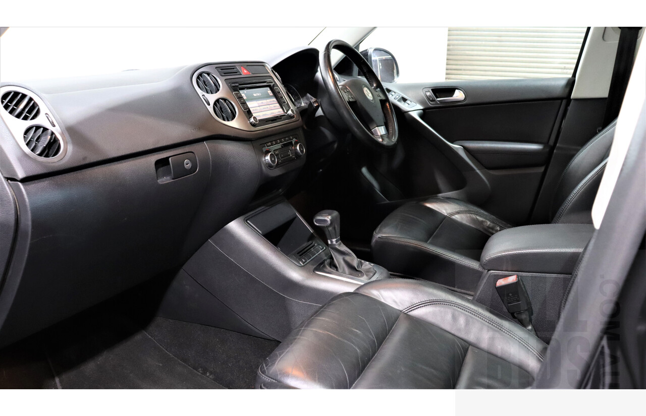2/2010 Volkswagen Tiguan TSI 5NC 4d Wagon Black 2.0L Turbo