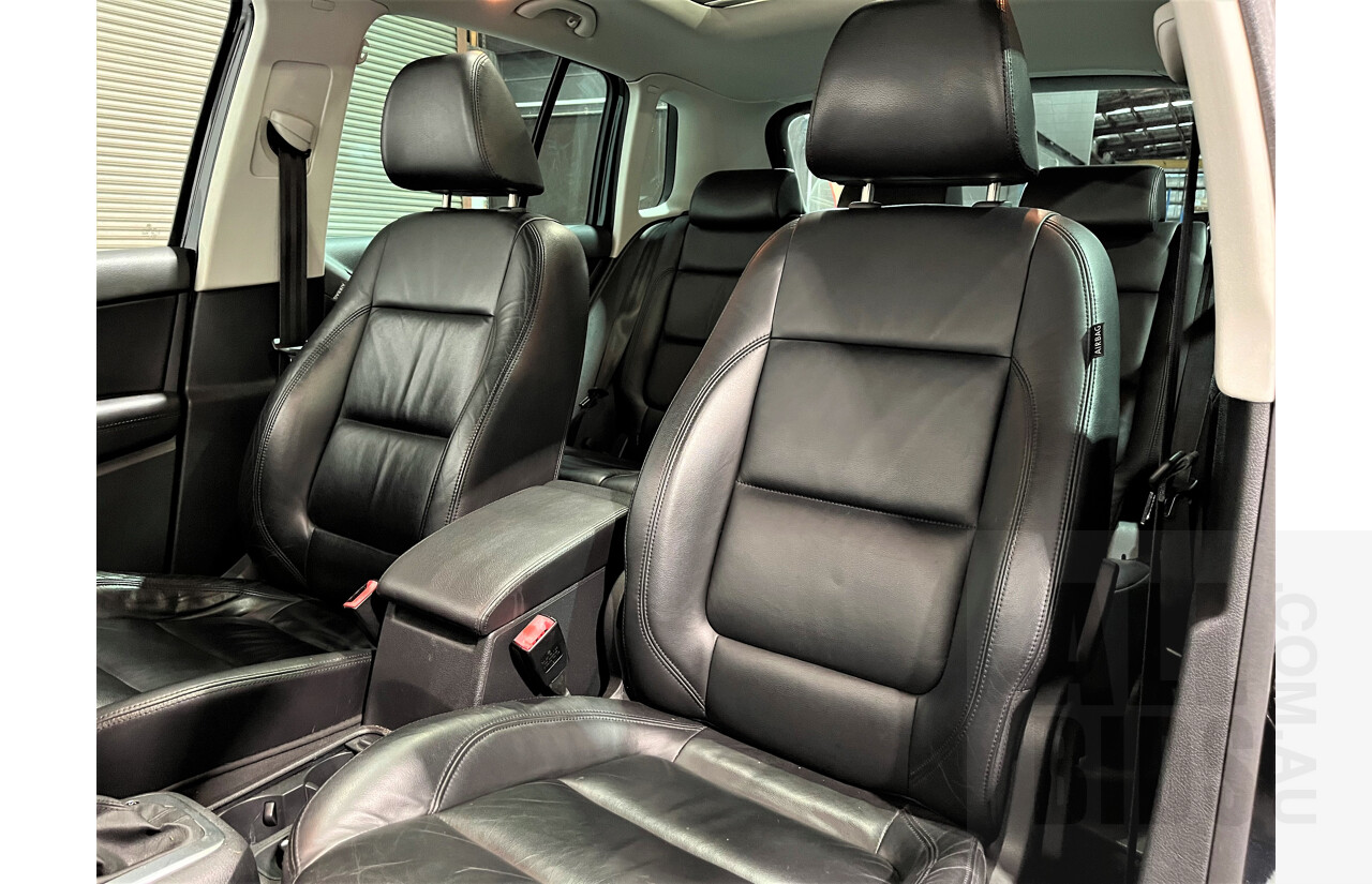 2/2010 Volkswagen Tiguan TSI 5NC 4d Wagon Black 2.0L Turbo