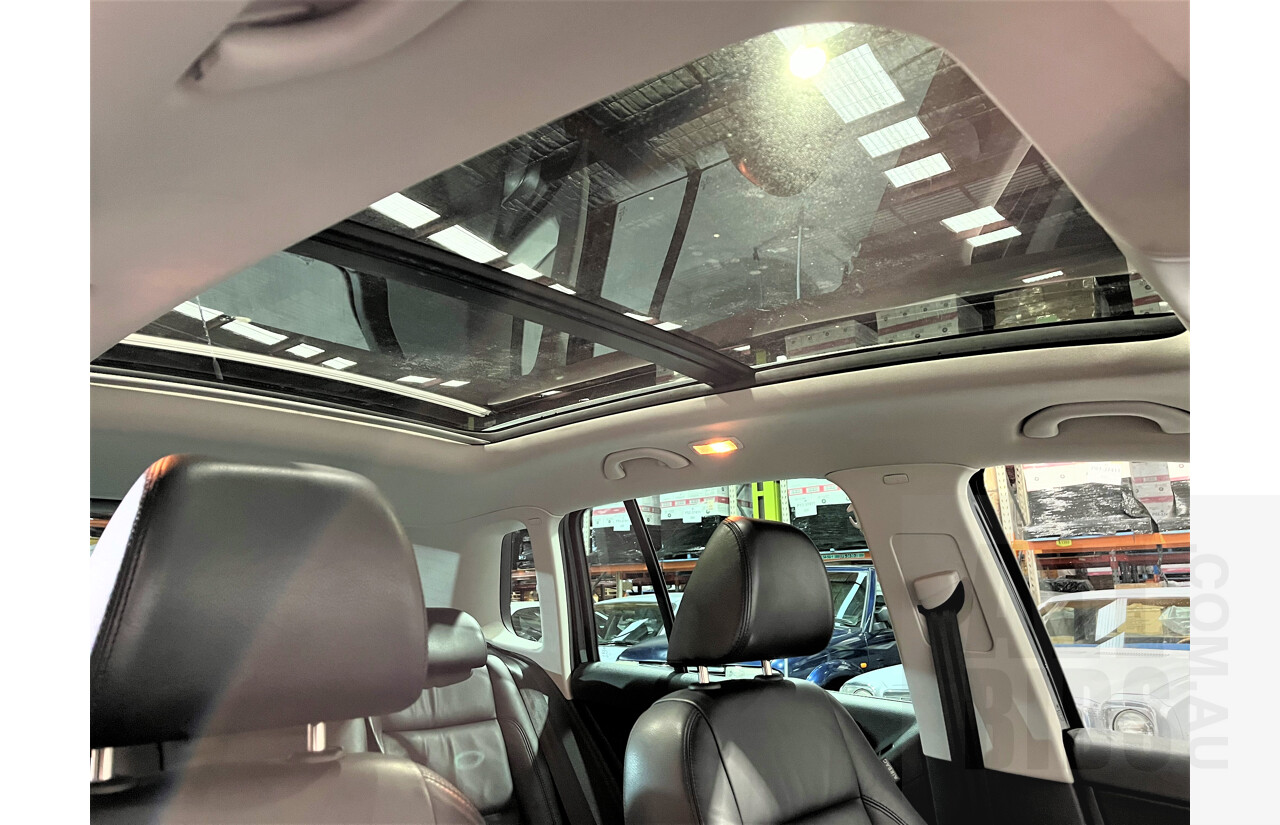 2/2010 Volkswagen Tiguan TSI 5NC 4d Wagon Black 2.0L Turbo