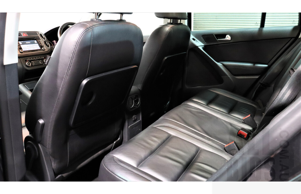 2/2010 Volkswagen Tiguan TSI 5NC 4d Wagon Black 2.0L Turbo