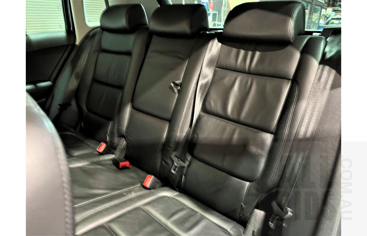 2/2010 Volkswagen Tiguan TSI 5NC 4d Wagon Black 2.0L Turbo