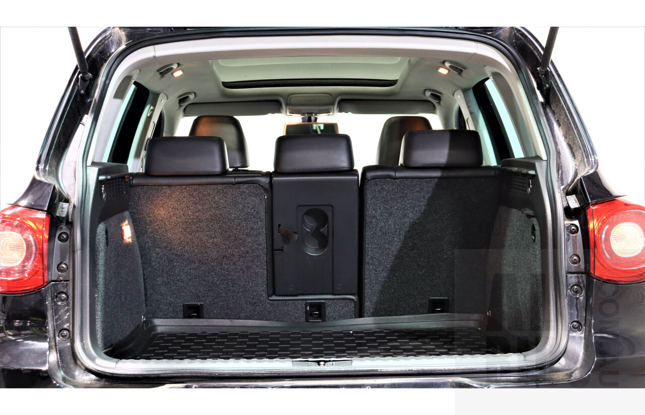 2/2010 Volkswagen Tiguan TSI 5NC 4d Wagon Black 2.0L Turbo