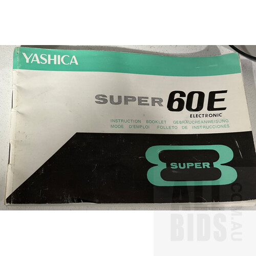 Vintage Yashica Super 60 E Electronic 8mm Movie Camera Designed for Super 8 Film Cartridges in Original Hard Case, and Hanimex Movielux Super 8 Movie Light in Original Box