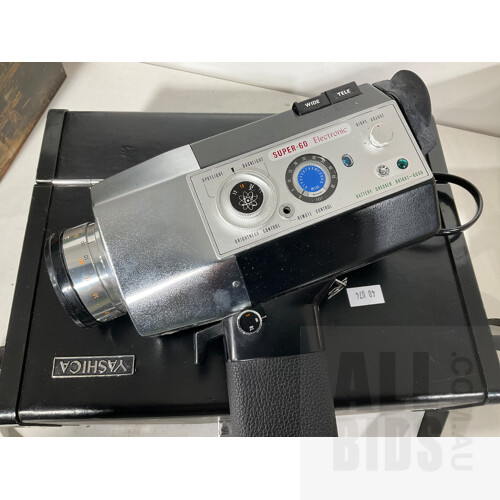 Vintage Yashica Super 60 E Electronic 8mm Movie Camera Designed for Super 8 Film Cartridges in Original Hard Case, and Hanimex Movielux Super 8 Movie Light in Original Box