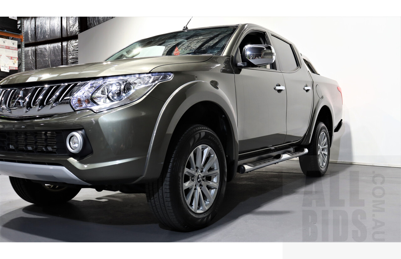 10/2015 Mitsubishi Triton GLS (4x4) MQ MY16 Dual Cab Utility Green 2.4L