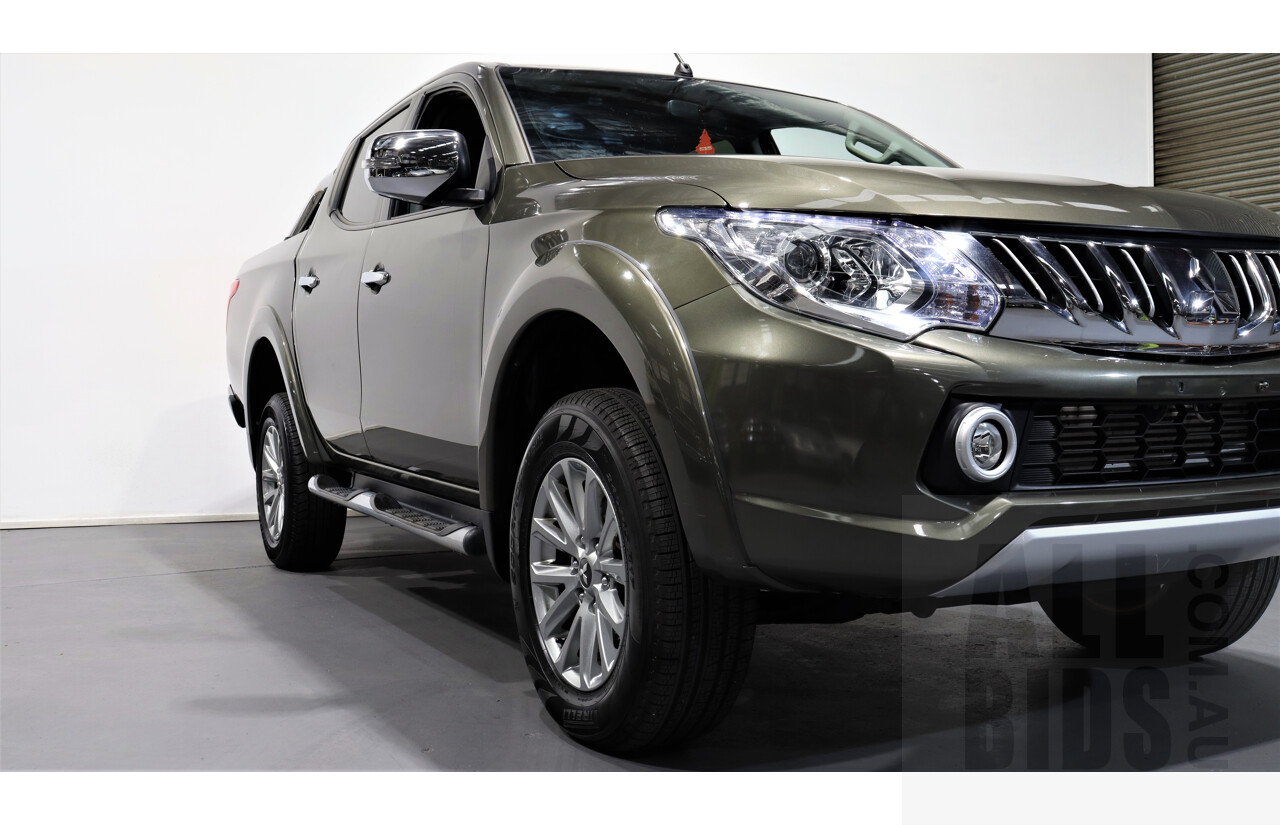 10/2015 Mitsubishi Triton GLS (4x4) MQ MY16 Dual Cab Utility Green 2.4L