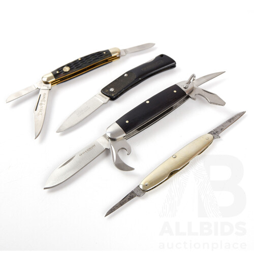 Collection of Four Pocket Knives, Including Magnum by Boker, Another Boker and More