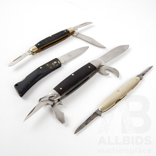 Collection of Four Pocket Knives, Including Magnum by Boker, Another Boker and More