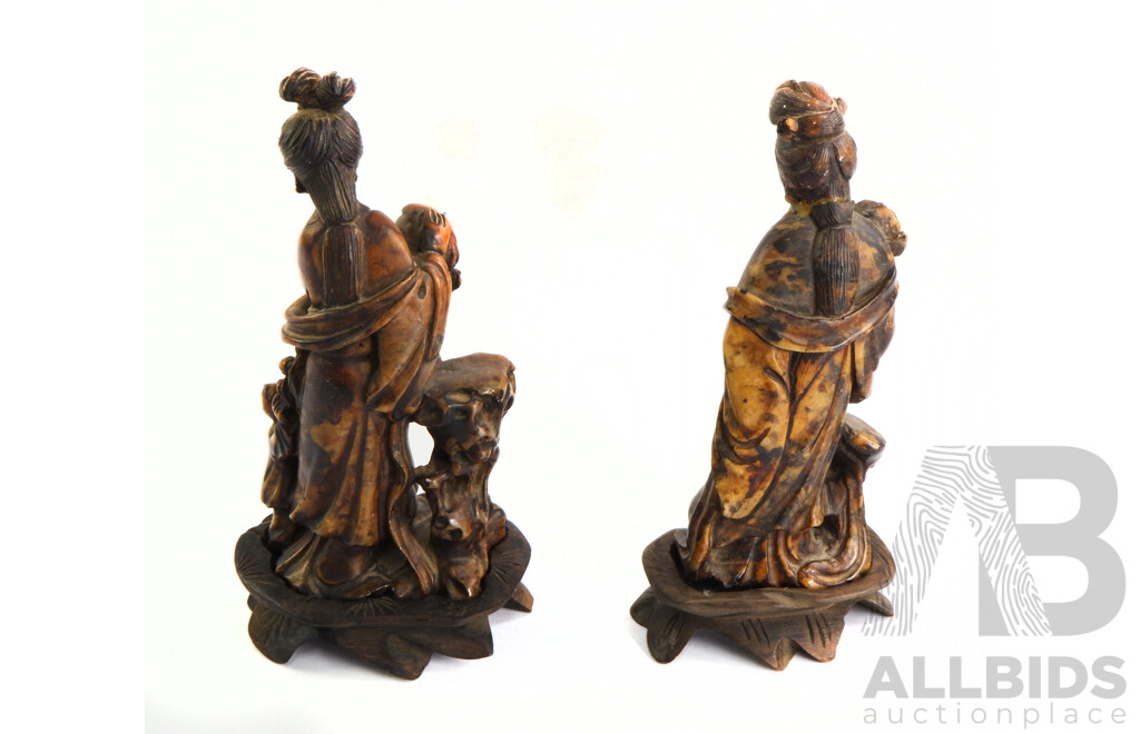 Two Hand Carved Chinese Soft Stone Sculptures of Females on Wooden Stands