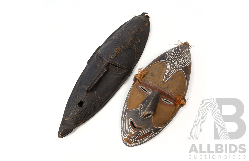 Two PNG Sepik River Hand Carved Wooden Masks