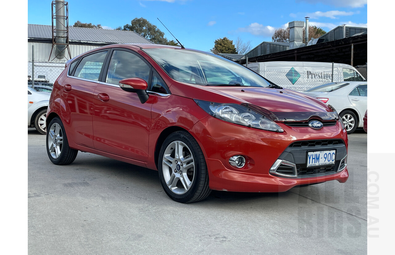 9/2011 Ford Fiesta Zetec WT 5d Hatchback Orange 1.6L