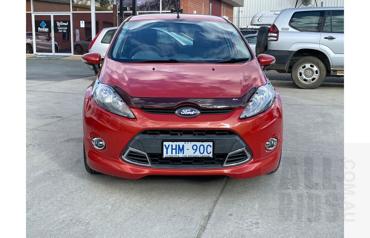 9/2011 Ford Fiesta Zetec WT 5d Hatchback Orange 1.6L