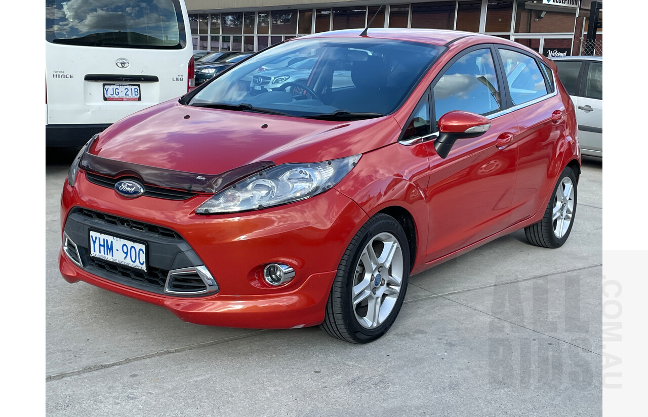 9/2011 Ford Fiesta Zetec WT 5d Hatchback Orange 1.6L