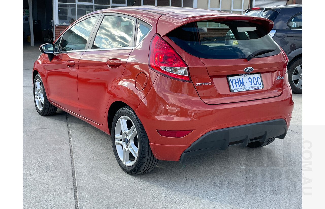 9/2011 Ford Fiesta Zetec WT 5d Hatchback Orange 1.6L