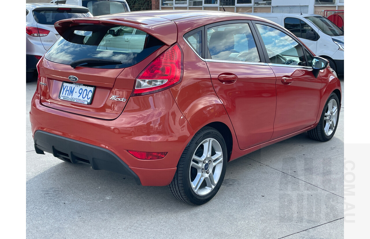 9/2011 Ford Fiesta Zetec WT 5d Hatchback Orange 1.6L