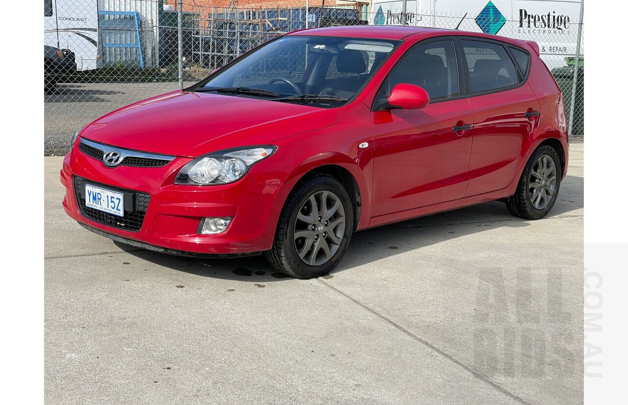 4/2012 Hyundai i30 Trophy FD MY12 5d Hatchback Red 2.0L