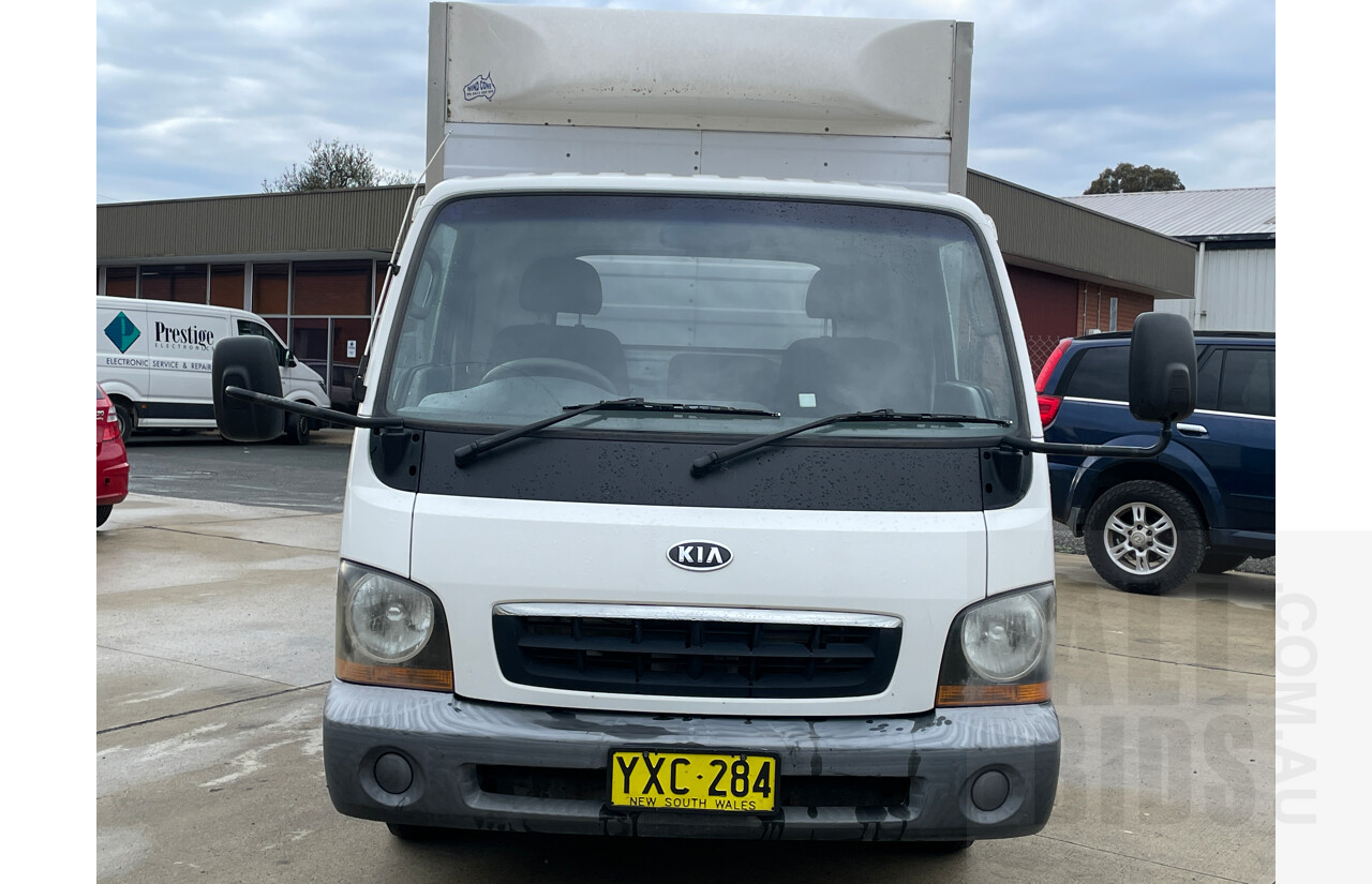 8/2003 Kia K2700 TU Pantech White 2.7L